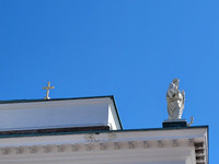The cross and the statue